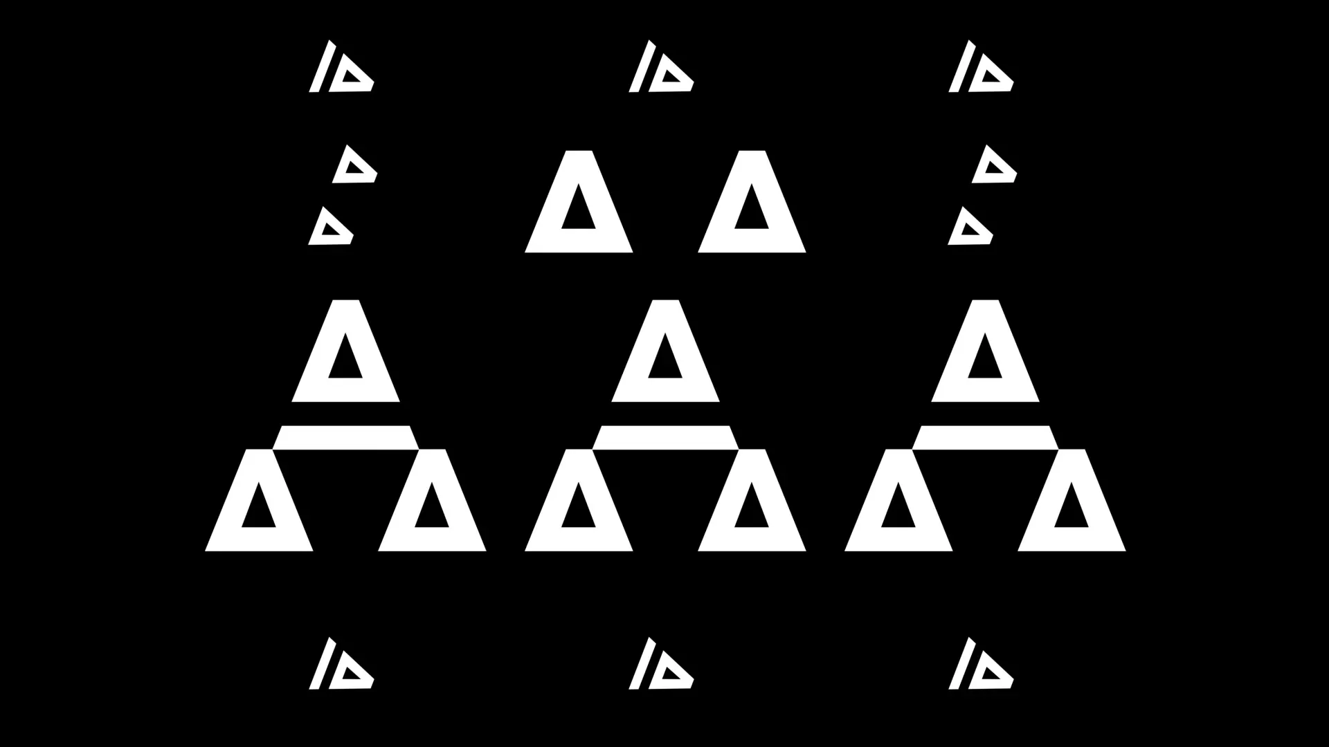 A grid of white triangles on black, a frame from the Studio Glin showreel.